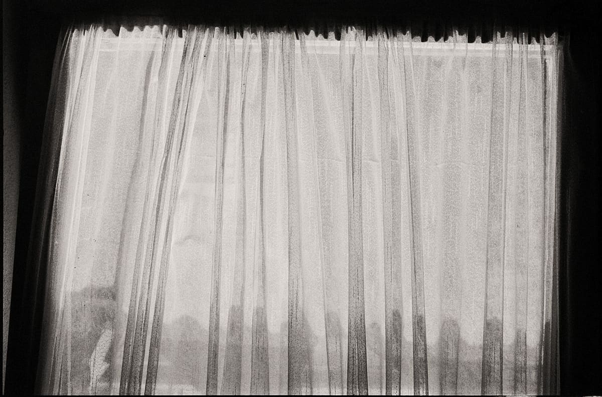 Sheer curtains with soft, subtle lighting.